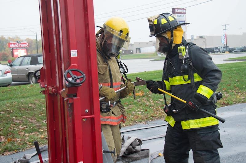 two firefighters