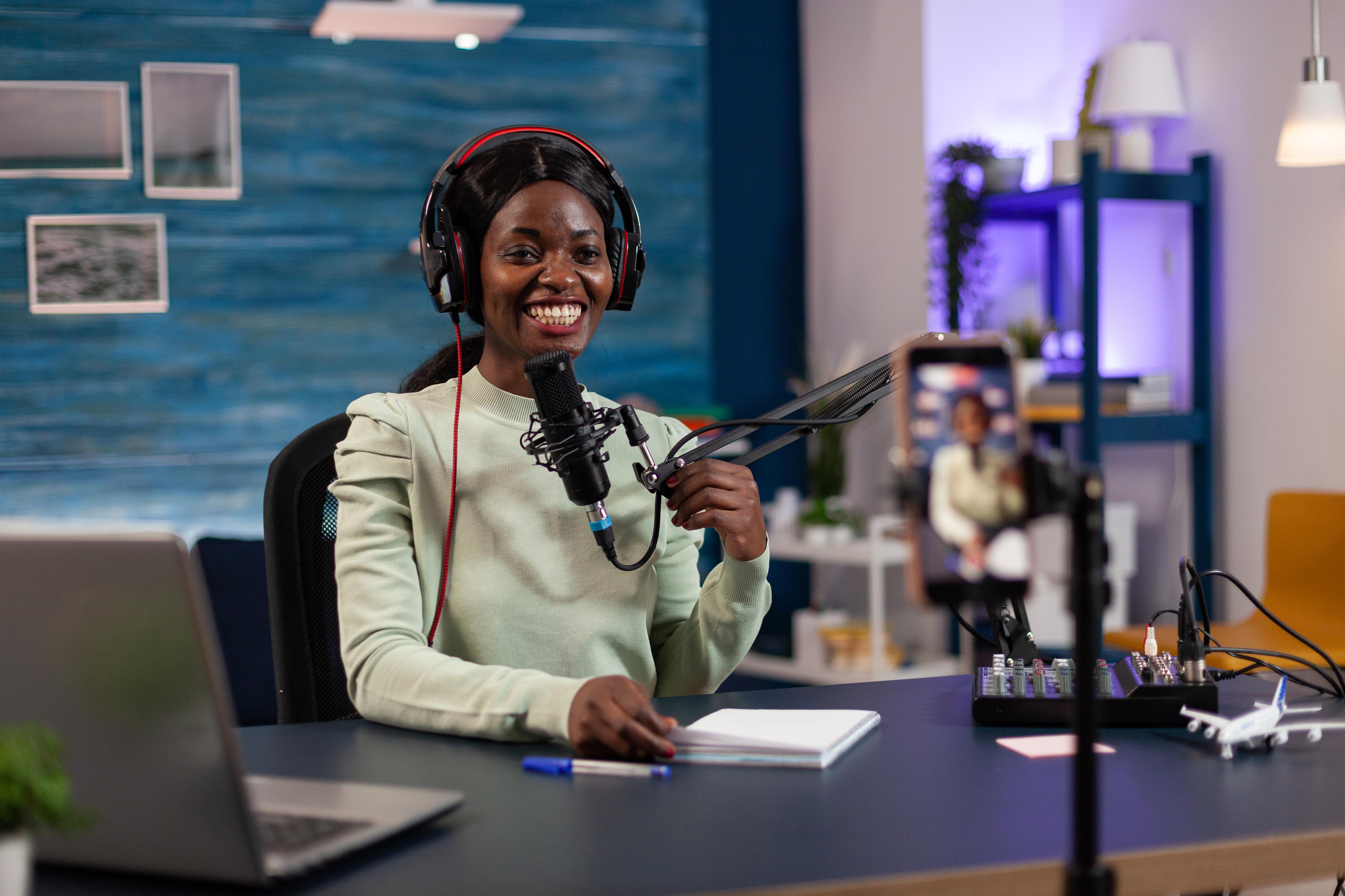 Female broadcasting student recording a video